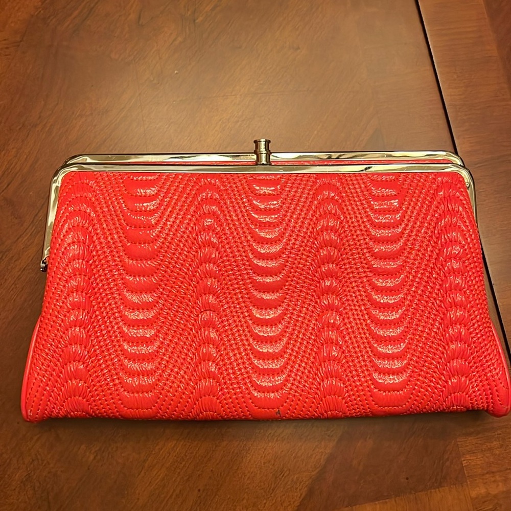 Hobo clutch new never used coral color!